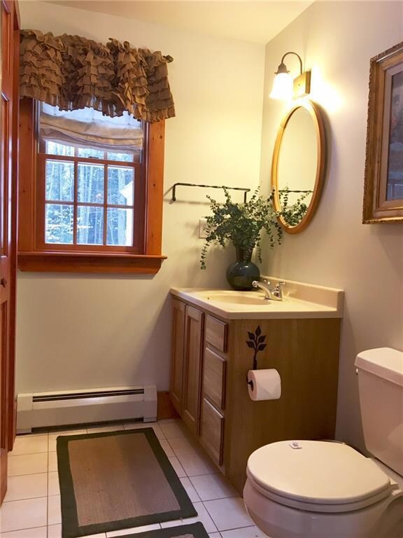 1st floor 1/2 Bath with Laundry to left
