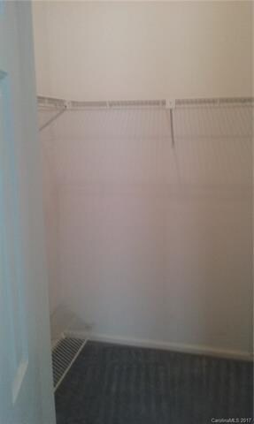 walk in closet in master bedroom