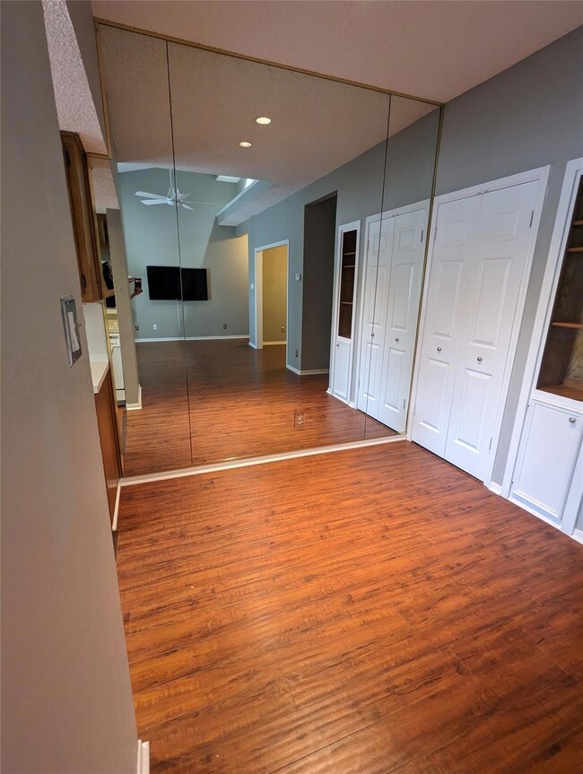 Unfurnished room featuring wood finished floors, 