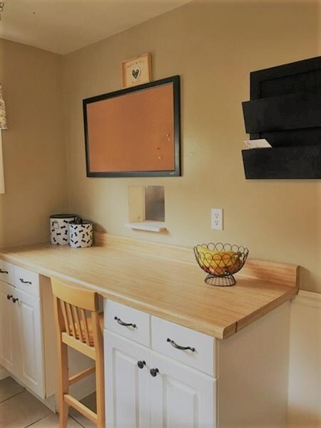 Cute desk nook in the kitchen.