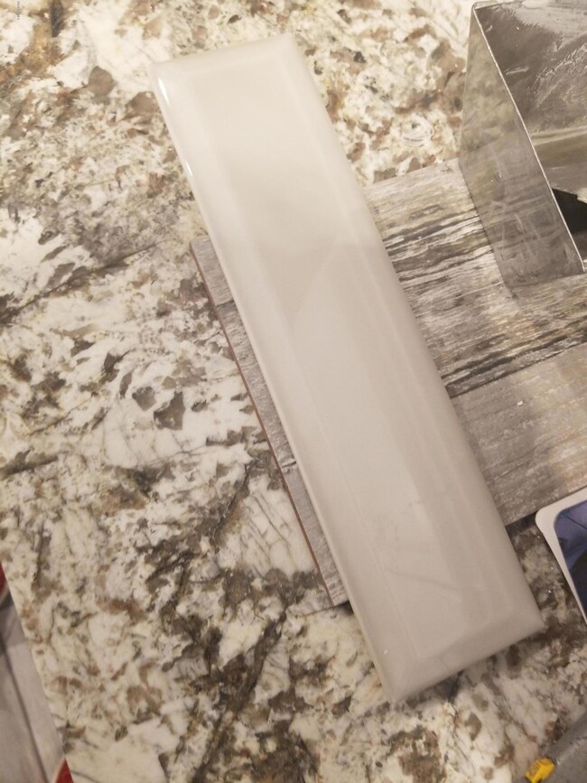 subway tile, tile floor and counterop