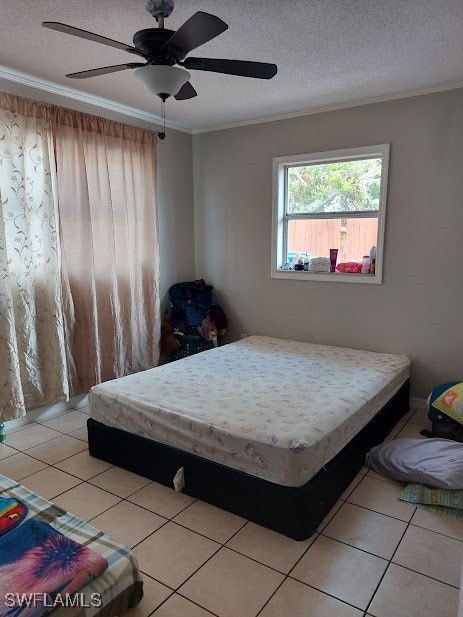Bedroom featuring crown molding, light tile patter