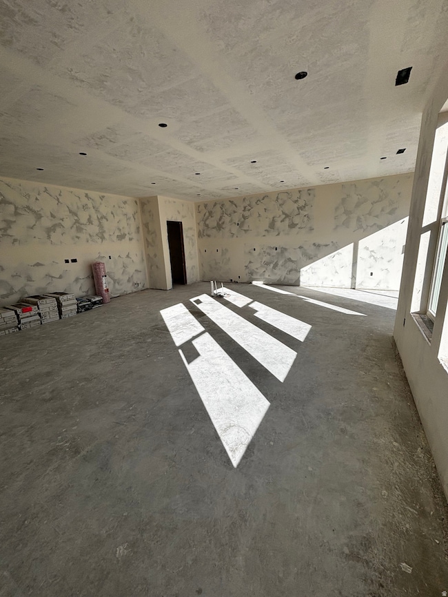 Spare room with concrete flooring