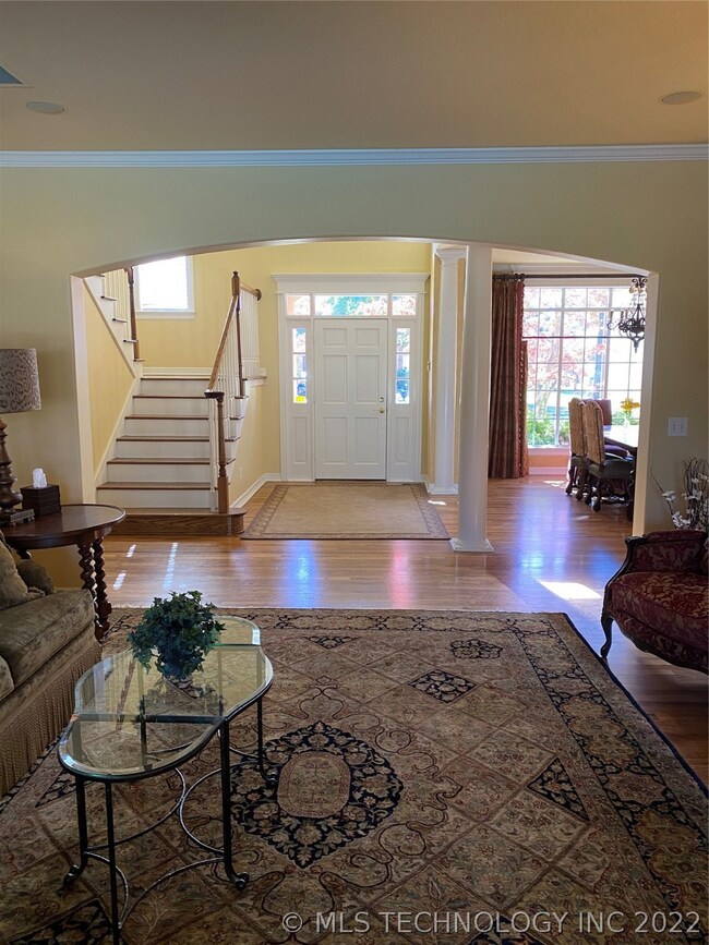 Open foyer into formal living and dining.