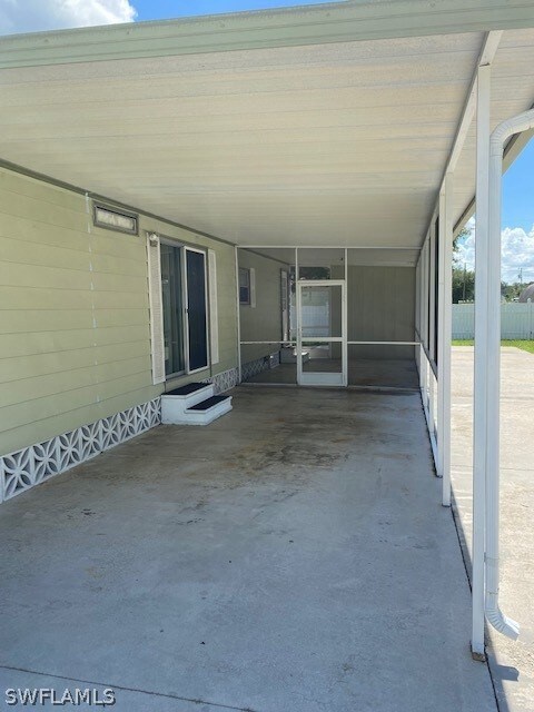 28x12 Carport that extends to an 18x12 Lanai
