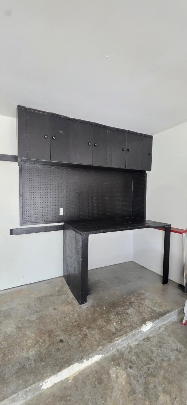 Enjoy the luxury of built-in shelving and a custom