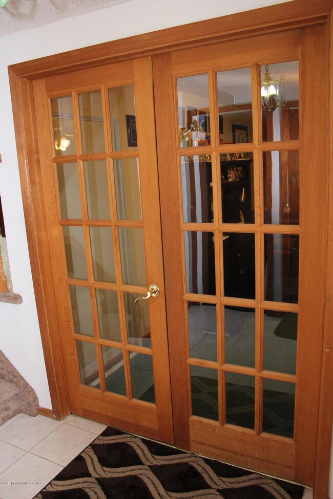 3 French doors to Bonus Room Right