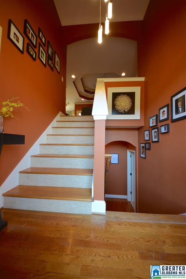 Hardwood floors w/ newly tile faced steps ! LOVE