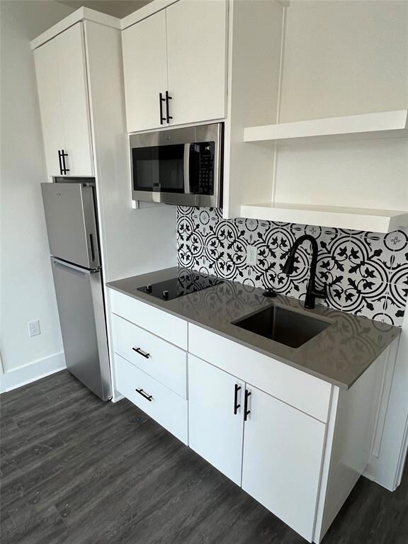 Kitchen featuring stainless steel appliances, a s