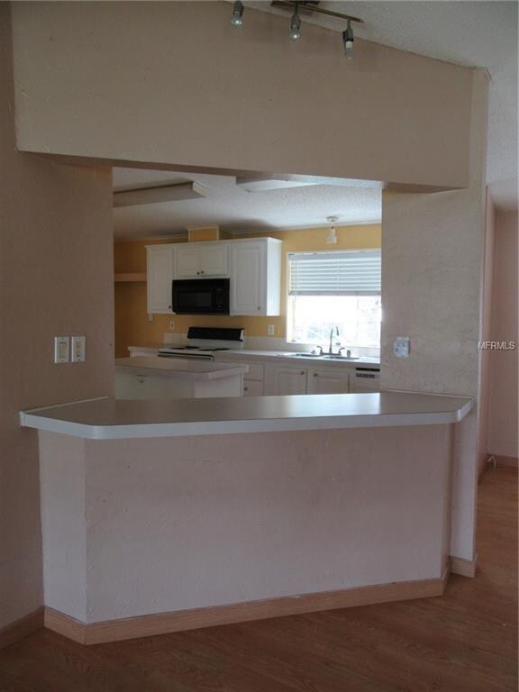 Breakfast bar ~ great open floor plan.
