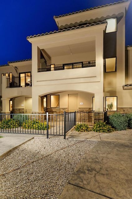 3-story Douglas plan at night