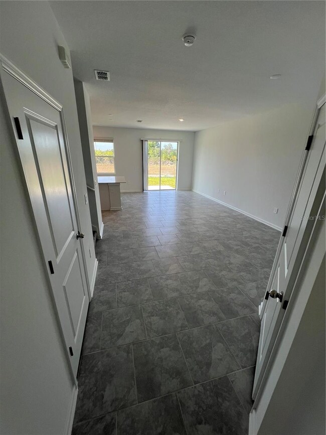 3299 Laurent Loop, Davenport, FL 33837 - photo 7