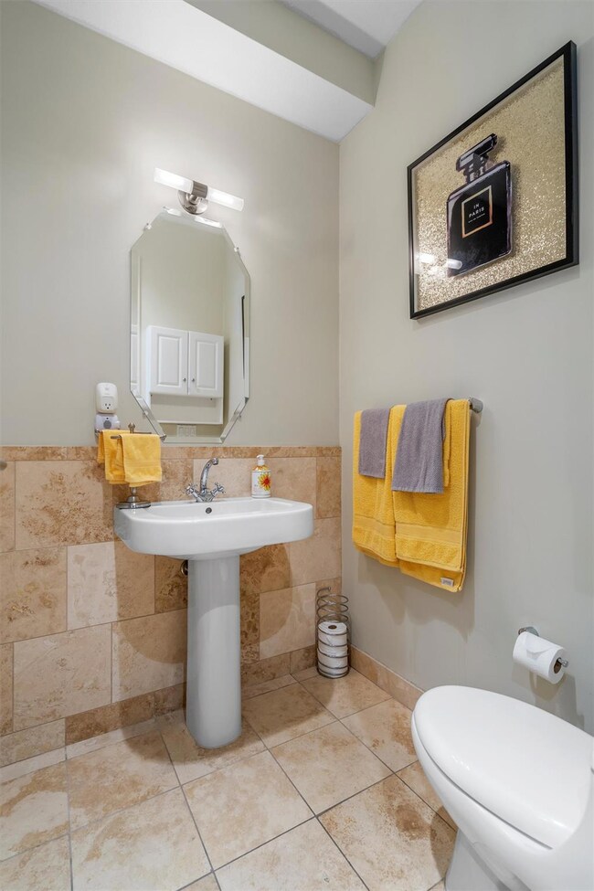 Bathroom featuring tile patterned flooring, tile 