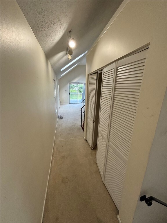 Entry hallway with steps to the right
