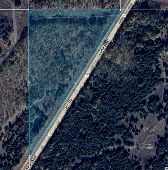 Aerial overview of property's location featuring property boundaries highlighted