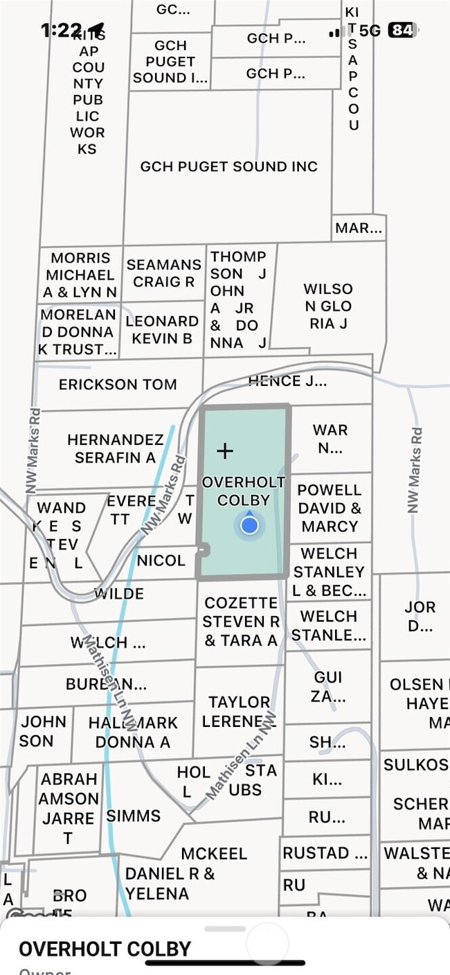 For Sale sign and easiest way to access the property is from Mathisen Land NW.