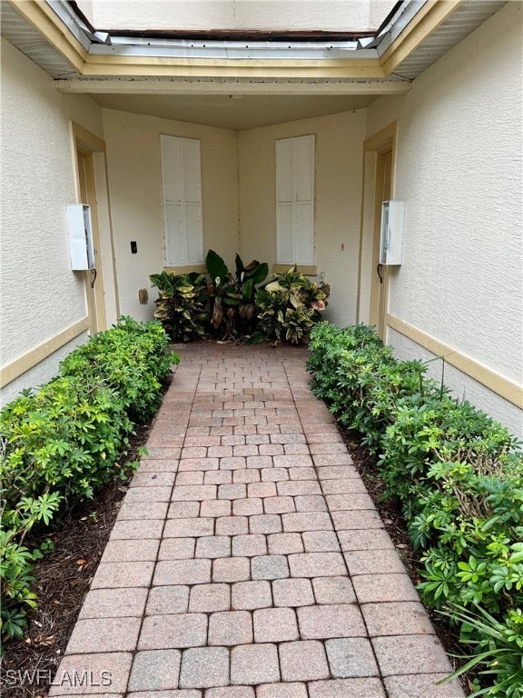 Walkway to entry which is on the left