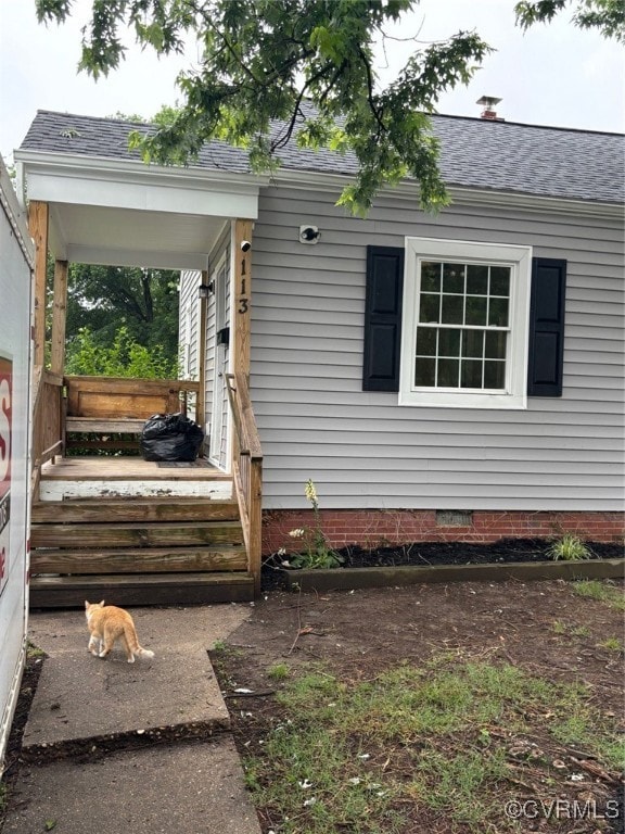 View of home's exterior featuring crawl space and