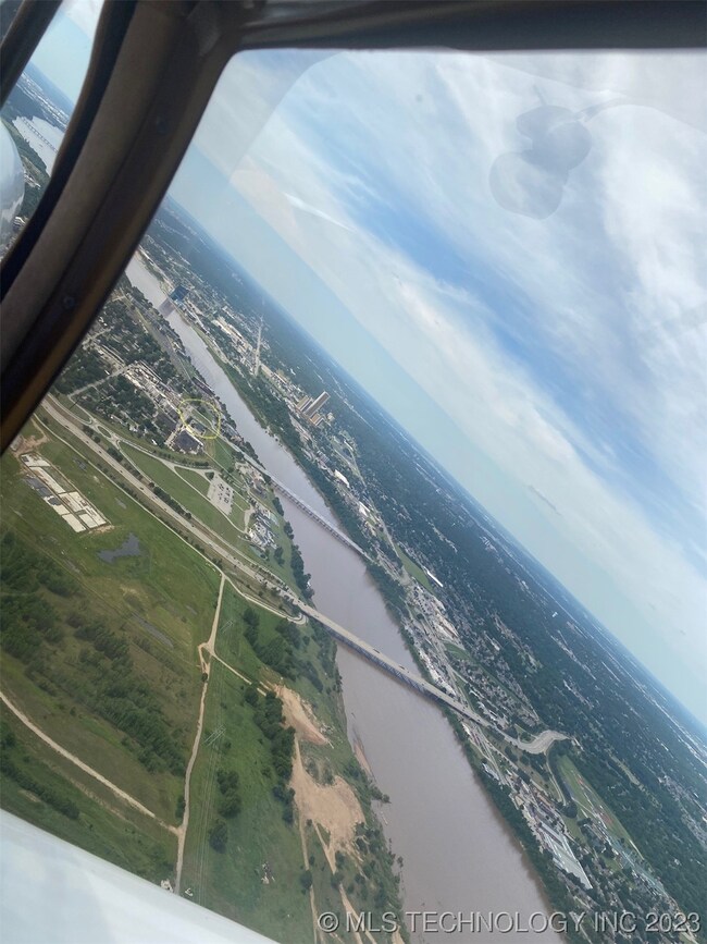 Airplane view looking at the Jenks bridge and this