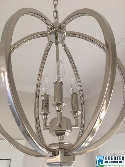 FOYER WELCOMES YOU WITH THIS BEAUTIFUL FIXTURE