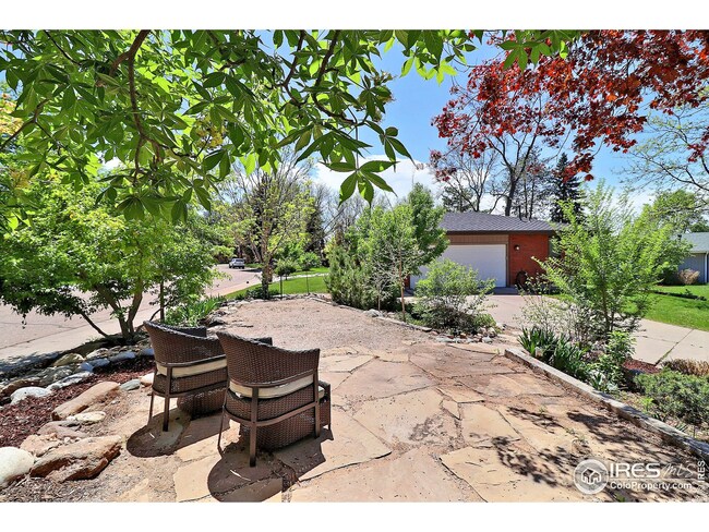 Sit Out on your Front Patio Surrounded By the Gorgeous Landscape