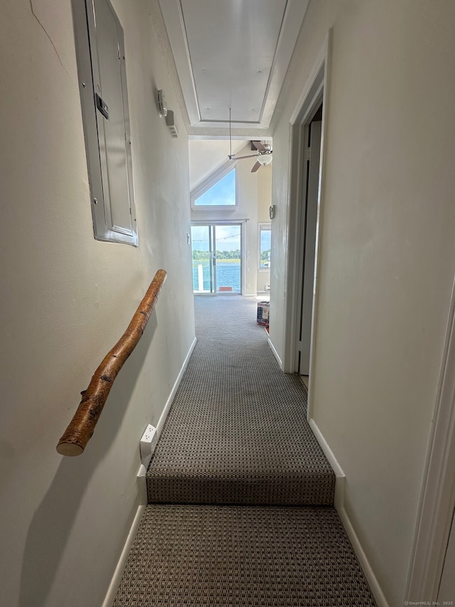 Hallway to bedroom, bonus room, bathroom & laundry