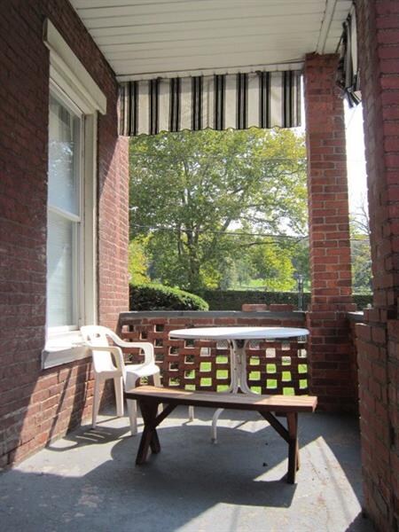 Tranquil covered 1st floor balcony.