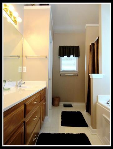 Master Bath with Double Vanities & Large Garden Tub.