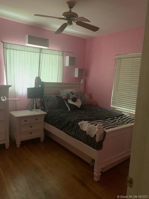bedroom 2 with white oak floors