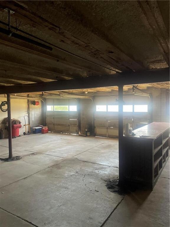 34'2x34'6 area with 2 garage doors