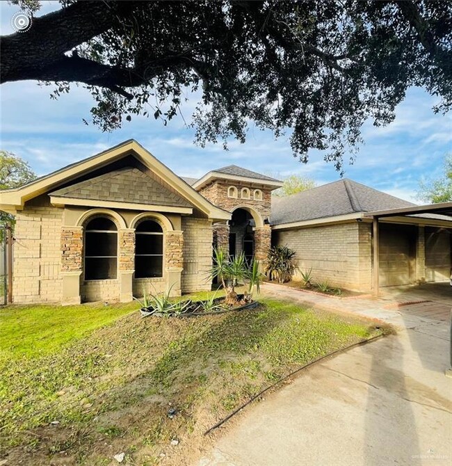 View of front of home featuring a front lawn
