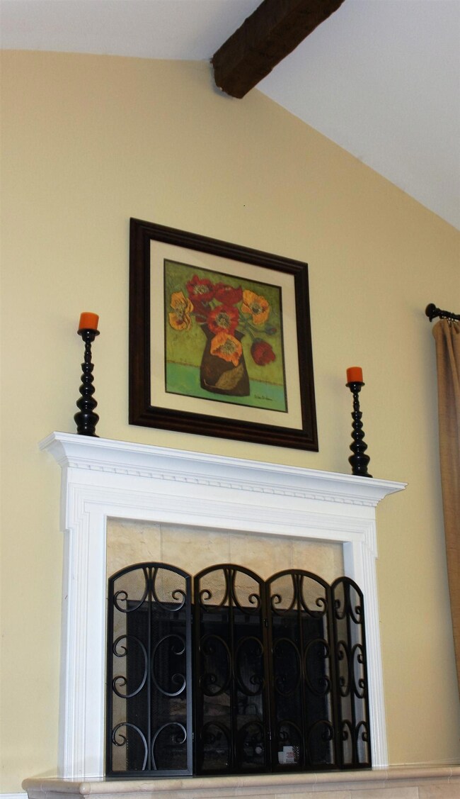 Fireplace make a perfect centerpiece to this wonderful living room space.