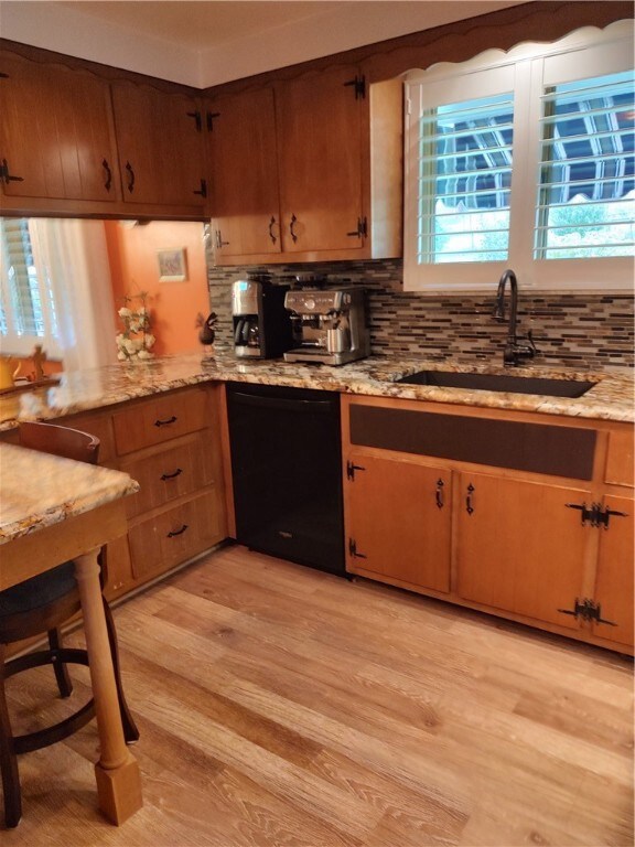 Dish washer, breakfast bar, wide plank flooring