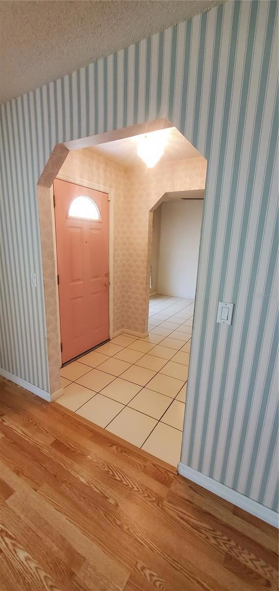 Foyer view from formal living room into the Dining Room.