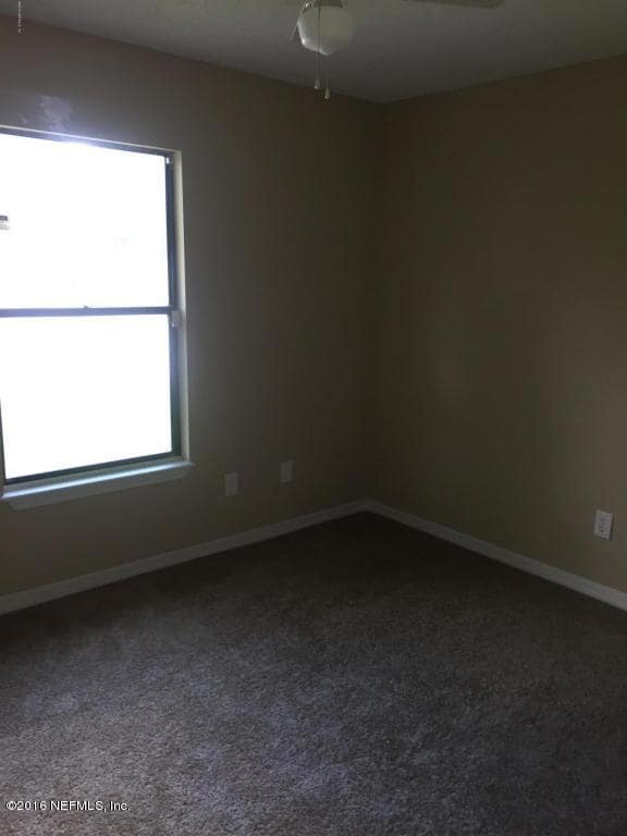 7668 Melissa Ct N, Jacksonville, FL 32210 - photo 4