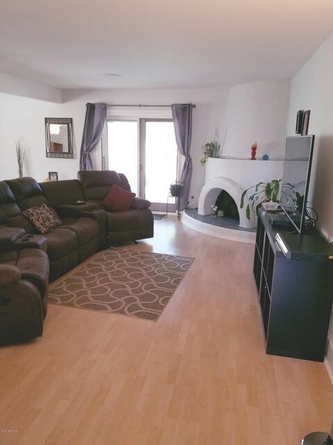 Great room with Bee-hive FP