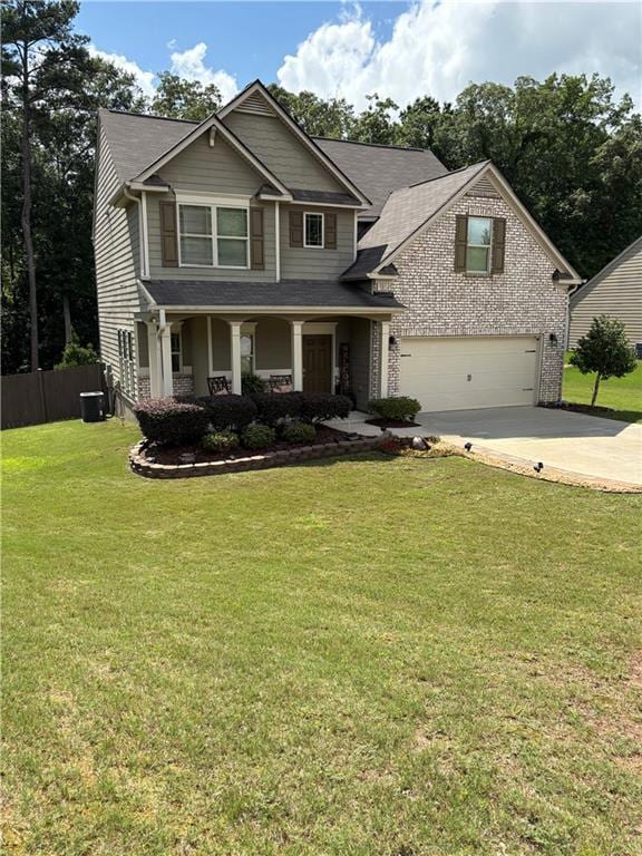 Craftsman inspired home with a garage, concrete driveway, a porch, and a shingled roof