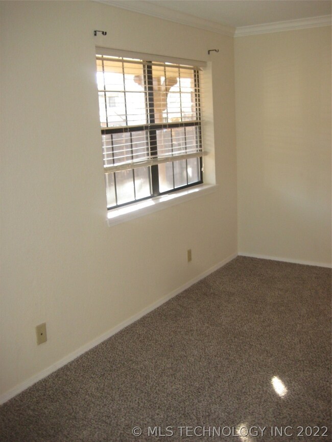 Double Windows overlook Privacy Fenced Courtyard
