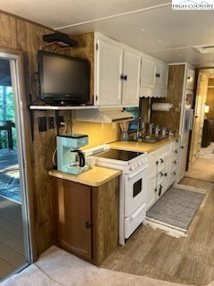 Kitchen offers new stove and hot water heater