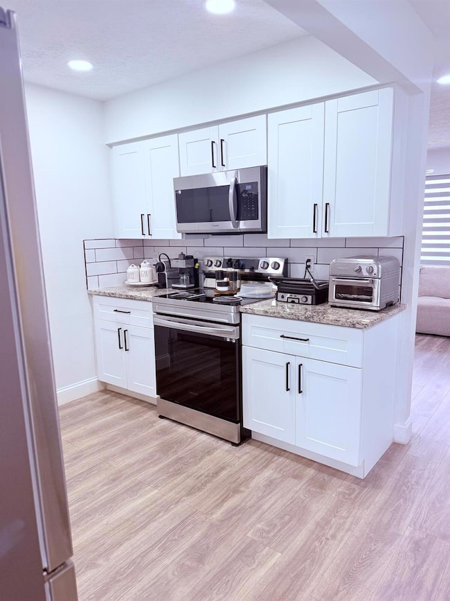 302 SW Whitmore Dr, Port Saint Lucie, FL 34984 - photo 7