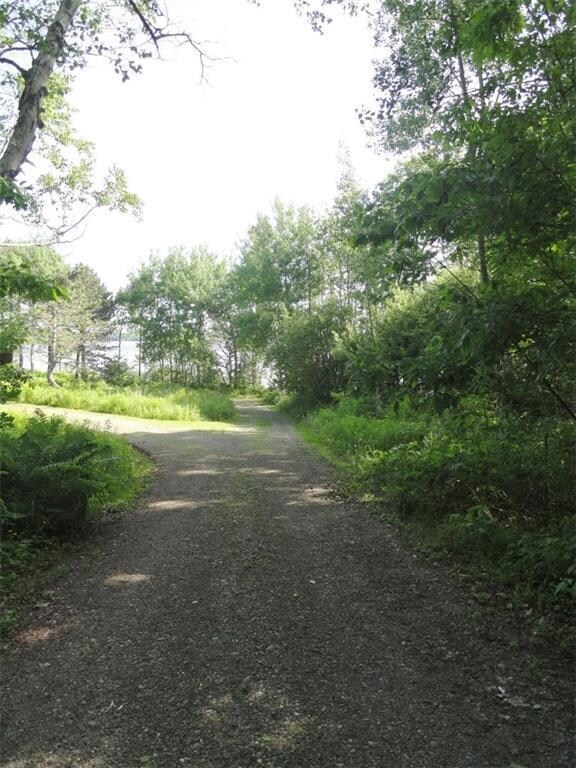 Upper end of right of way to water.