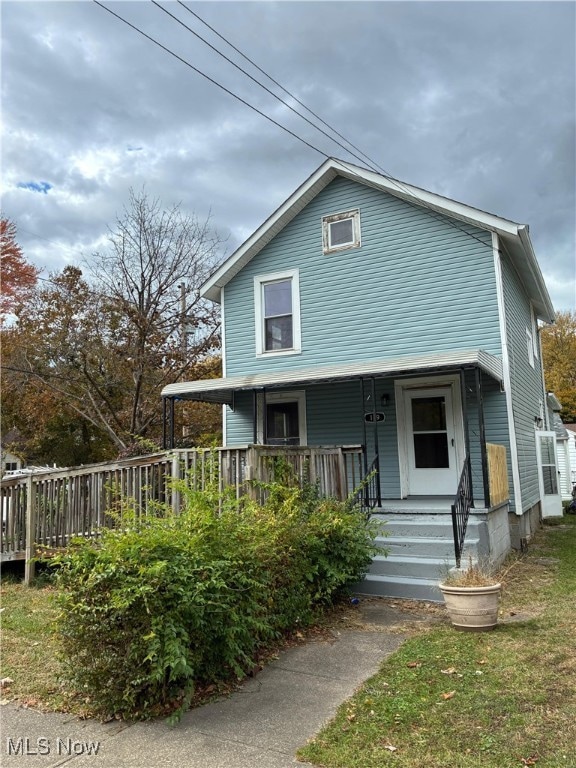 View of front facade featuring covered porch