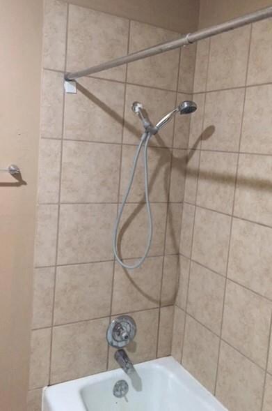 Bathroom with shower / tub combination