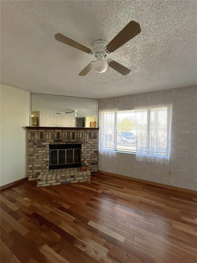 living room with Wood burning fireplace