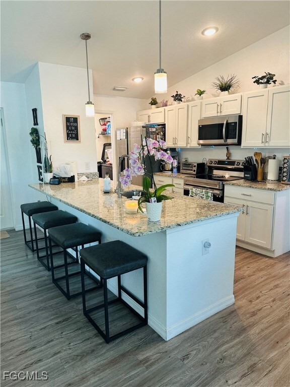 Kitchen featuring stainless steel appliances, a ki