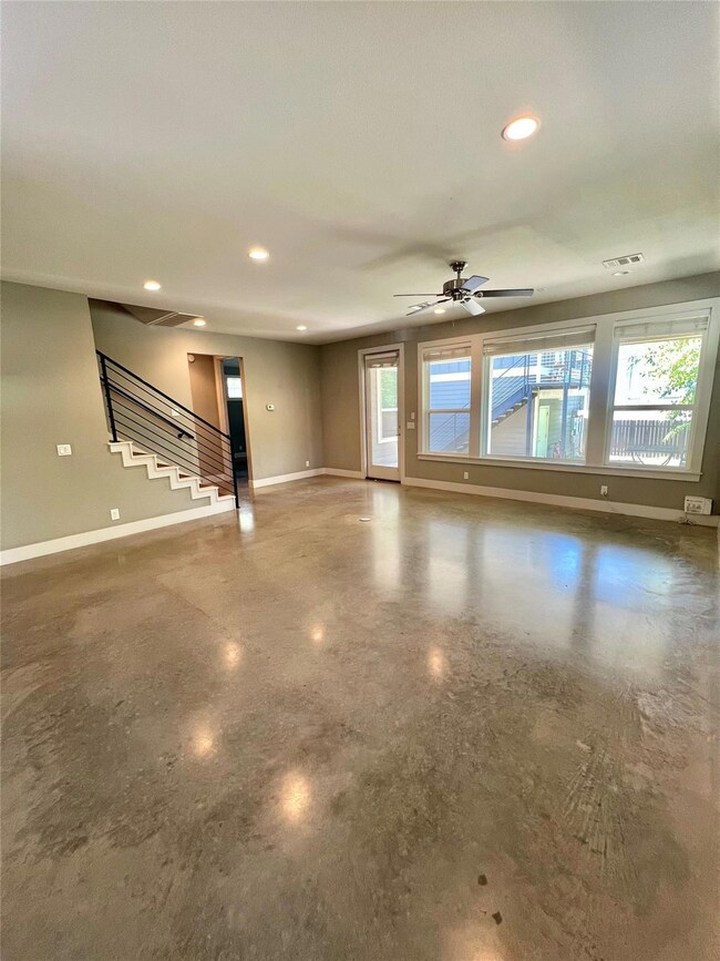 Unfurnished living room with recessed lighting, s