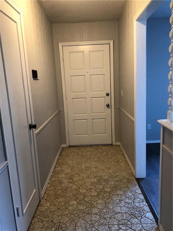 Looking at front door from entryway.