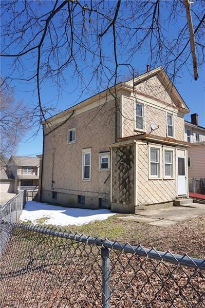 Back of the House with Concrete Patio leading into