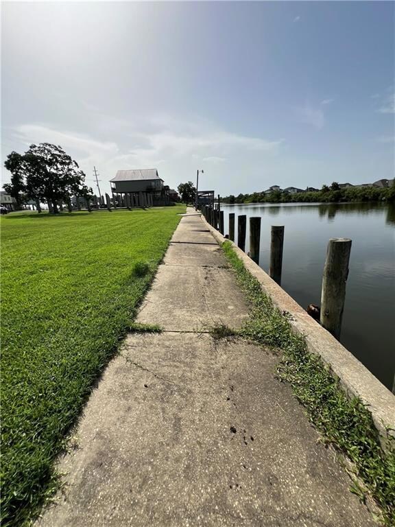 View of the back of the lot on the canal. Reinforced bulkhead.
