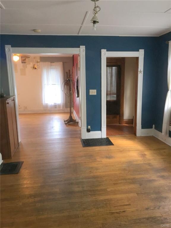 Formal Dining Room with opening to family room.